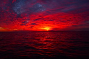 deep red sunset over water