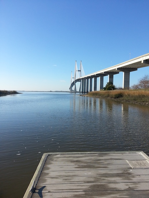 dock and water with bridge to the left