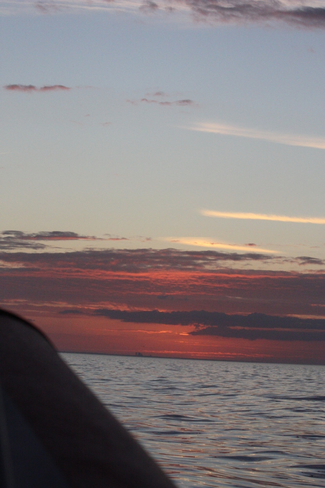 sunset on the surface of the water