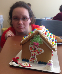 gingerbread house with broken santa